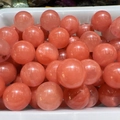 Spherical translucent pink-orange natural crystal quartz balls for home decoration - Synthetic Watermelon Red