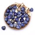 Pierres de sodalite naturelle polies en forme de cœur avec motifs mouchetés bleus - Pierre à Points Bleus