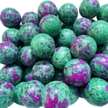 Spherical Ruby in Zoisite beads with vibrant green and purple natural stone patterns - Synthetic Ruby in Zoisite
