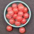 Round 20mm strawberry quartz stone spheres without holes in a green bowl dish - Watermelon Red (Synthetic)