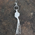 Handmade bohemian keychain featuring a raw white crystal stone in a woven cotton net - White Crystal