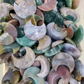 Polished natural agate crescent moon stones in assorted colors and textures - India Agate