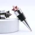 Star-shaped pink natural crystal stone wine stopper with durable zinc alloy base - Rhodonite