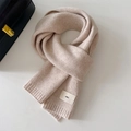 Thick beige knitted scarf for women with ribbed ends and 'emo' label on white background - 20x156cm / Oatmeal