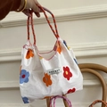 Sac fourre-tout en toile à fleurs rouges et orange avec poignées en corde et étiquette - S / Fleur colorée