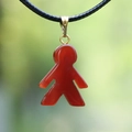 Translucent red agate boy pendant necklace with elegant golden clasp and black cord - Doll
