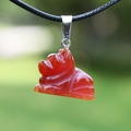 Red agate sun bear pendant with black braided rope necklace and stainless steel clasp - Dog