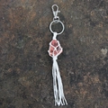 Handmade strawberry quartz stone keychain with white woven macrame and tassel detail - Watermelon red