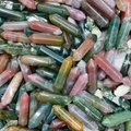 Bulk natural crystal points featuring mixed quartz tiger eye and aventurine pillars - India Agate