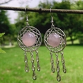 Pink quartz dreamcatcher earrings with silver metal drops hanging on a wooden branch - Rose Quartz