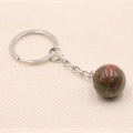 Portachiavi con sfera in pietra unakite naturale e anello in metallo argento - Unakite