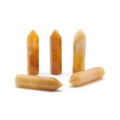 Set of five yellow natural crystal hexagonal pillars with polished mineral texture - Topaz
