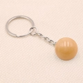 Portachiavi minimalista con sfera di cristallo arancione lucida e catena metallica - Topazio