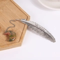 Silver feather bookmark with unakite moon pendant on a minimalist wooden tray - Unakite