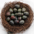 20mm egg-shaped polished Unakite natural stones displayed in a small woven bird nest - Dragon Blood Jasper (1pc)