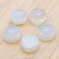 Five opalite moonstone cabochons with iridescent glow on a natural bamboo base - Opal (Synthetic)