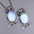 Vintage silver owl necklace featuring blue opal stone with detailed feather texture - Opalite (With Cord)