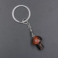 Polished red mushroom keychain crafted with natural stone and silver metal ring - Mahogany Obsidian