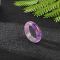 Purple natural agate stone ring with reddish textures on a black textured base - Amethyst
