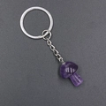 Polished amethyst mushroom keychain with silver ring and natural crystal texture - Amethyst