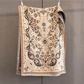 Detail of paisley jacquard pattern and soft fringe on reversible winter cashmere scarf - Beige Brown