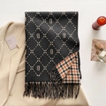 Close-up of thick scarf showing double-sided houndstooth and letter B patterns with tassels - 200*65cm / Black