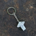 Natural spotted stone mushroom keychain with silver metal ring and polished finish - Tianshan Blue