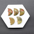 Five unakite crystal moon face stones in green and pink on a white tray - Unakite (Single Piece)