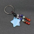 Handmade keychain featuring a translucent blue opal star and colorful gemstone beads - Synthetic Opal