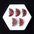 Five hand-carved natural red jasper moon face stones on a white hexagonal base - Red Jasper (Single Piece)