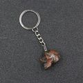 Natural red obsidian skull keychain pendant with hand-carved stone detail for Halloween - Sesame Jasper