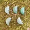 Set of five light green aventurine moon face carved natural stones on moss background - Green Aventurine (Single Bead)