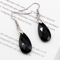 Elegant black faceted teardrop crystal earrings with silver-toned metal hooks - Obsidian