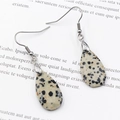 Dalmatian Jasper drop earrings with silver hooks on decorative paper background - Dalmatian Jasper