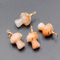 Handmade mushroom pendant in natural pink crystal with golden wire wrap design - Red Aventurine