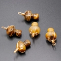 Handmade tiger eye crystal mushroom pendants with gold wire wrapping and decorative swirls - Tiger's Eye