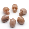 Set aus 6 natürlichen Sonnenstein-Kristallschädeln in Orange für Halloween-Dekoration - Violetter Aventurin