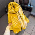 Detail of warm yellow and white plaid scarf featuring premium overlock edge stitching - 53*192cm / Yellow