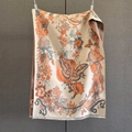Detail of vintage floral scarf with orange sunflowers and butterflies on beige fabric - Orange Red