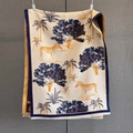 Detail of double-sided jacquard shawl with zebra and palm tree patterns and white fringes - Dark Blue