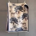 Detail of cashmere-like shawl featuring navy safari zebra prints and short white fringes - Navy Blue