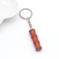 Bamboo shaped natural red jasper stone keychain with silver metal ring on white background - Red Jasper 1pc