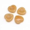 Set di quattro cristalli di topazio giallo a forma di cuore con texture in pietra naturale - Topazio