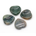 Set of four polished heart-shaped moss agate worry stones with natural green textures - India Agate