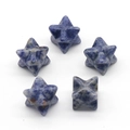Five blue sodalite merkaba star crystals with natural white veins on white background - Blue Spot Jasper