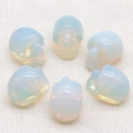 Set of 1-inch opalite crystal skull carvings with smooth light blue translucent finish - Opal (Synthetic)