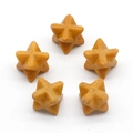 Set of five yellow natural stone Merkaba stars with detailed geometric carvings - Yellow Jasper