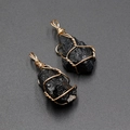 Handcrafted natural black crystal raw stone pendant with elegant gold wire wrapping - Black Tourmaline