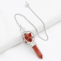 Polished red jasper Merkaba star pendant with silver frame and hex prism point - Red Jasper