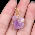 Handmade wire-wrapped natural purple amethyst raw stone pendant with golden metal finish - Light Amethyst Point